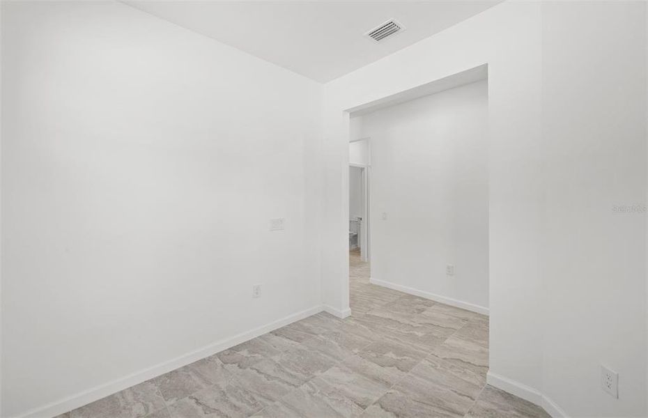 Spacious, unfurnished interior of a new home in Arbor Oaks, North Port (Image 20). Spacious, unfurnished interior of a new home in Arbor Oaks, North Port (Image 20).