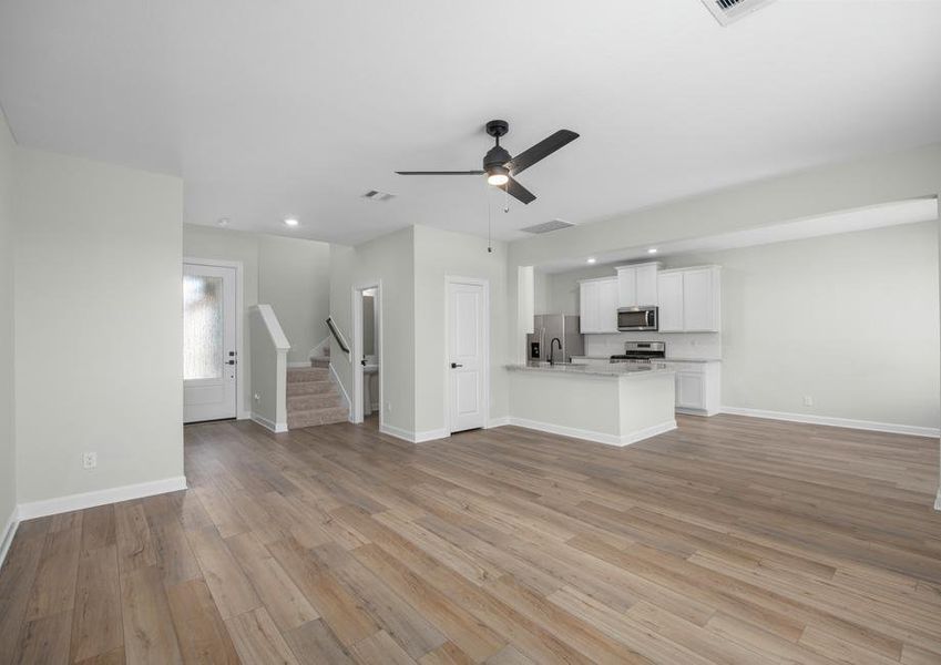 The spacious family room is open to the dining area and the kitchen.