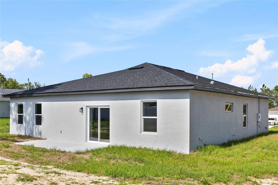Front exterior of a new home in , Ocala, FL, highlighting curb appeal (Image 1).
