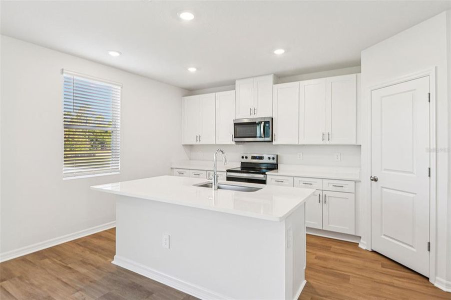 Furnished interior view inside a new home in Hilltop Vistas, Dade City (Image 6).