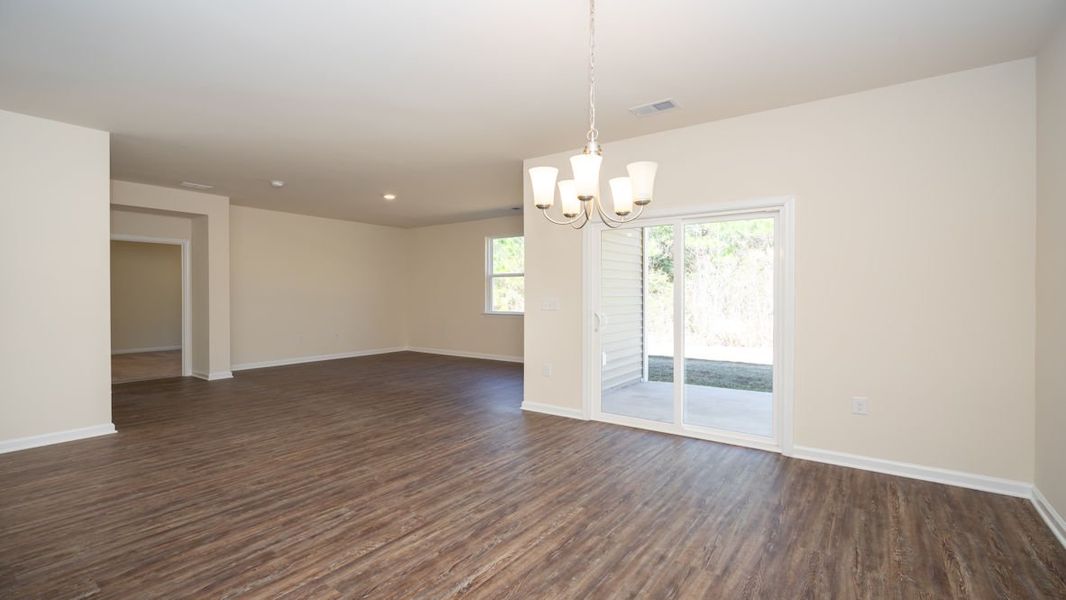 Representative unfurnished interior of a home built from the CALI by D.R. Horton in The Reserve at Wild Horse, Conway (Image 22).