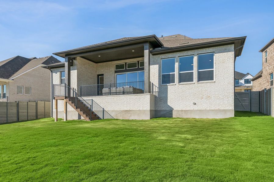 Exterior details and patio area of a home in Wolf Ranch – West Bend, Georgetown (Image 3).