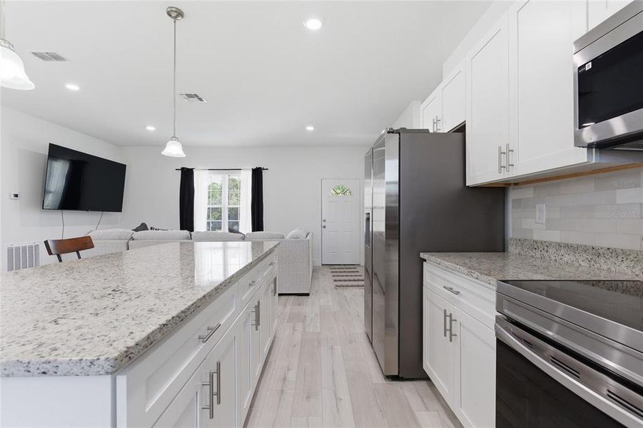 Furnished interior view inside a new home in , Ocklawaha (Image 16).