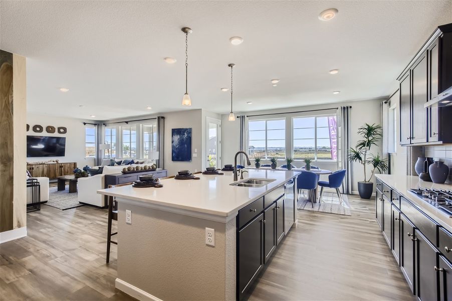 A kitchen with a large island. A kitchen with a large island.