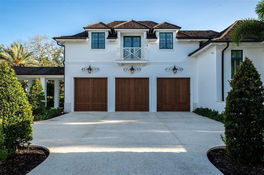 Front exterior of a new home in , Sarasota, FL, highlighting curb appeal (Image 2). Front exterior of a new home in , Sarasota, FL, highlighting curb appeal (Image 2).