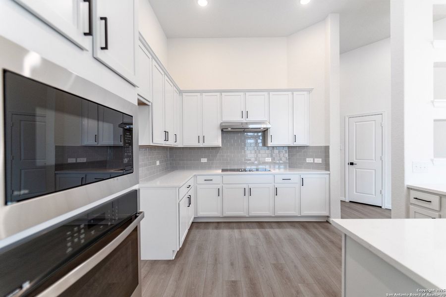 Furnished interior view inside a new home in The Woodlands at Medina Hills, Mico (Image 8).