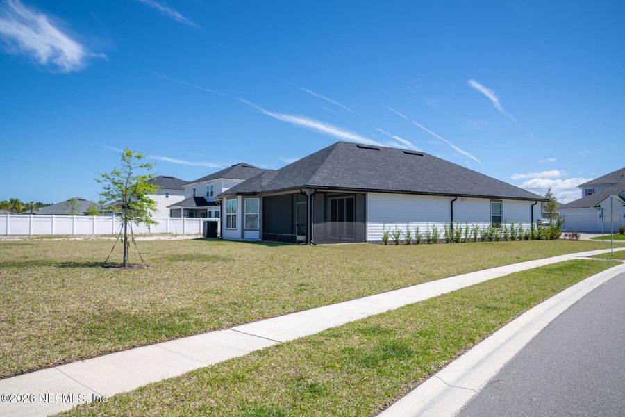 Front exterior of a new home in , St. Augustine, FL, highlighting curb appeal (Image 26).