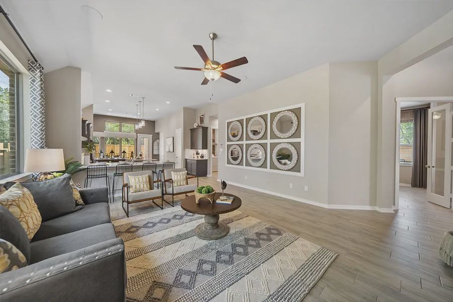 Representative furnished interior of a home built from the Marshall by Chesmar Homes in Stream Waters, Buda (Image 7).
