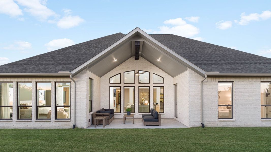 Representative exterior photo of a completed home built from the 3433W by Perry Homes in Palmera Ridge 70', Leander, TX (Image 11).