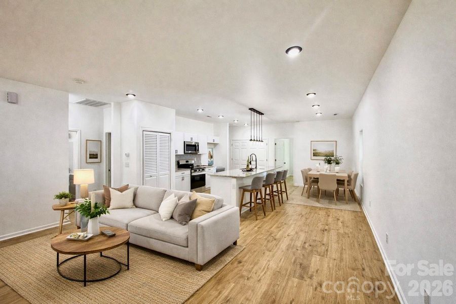 Living, Dining and Island with suggested staging.