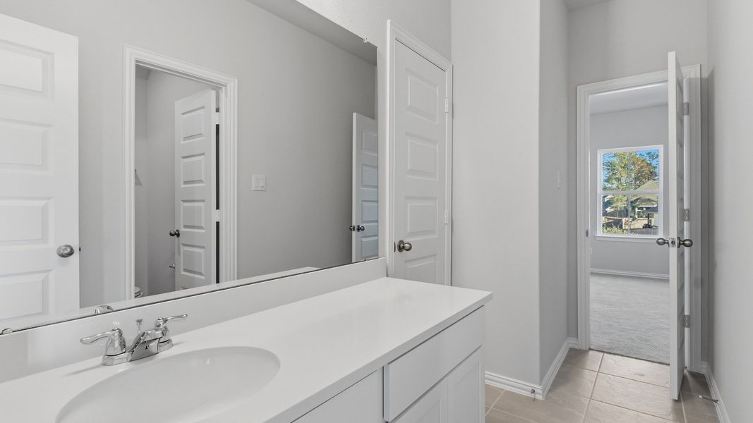 Furnished interior view inside a new home in The Woodlands Hills, Willis (Image 27).