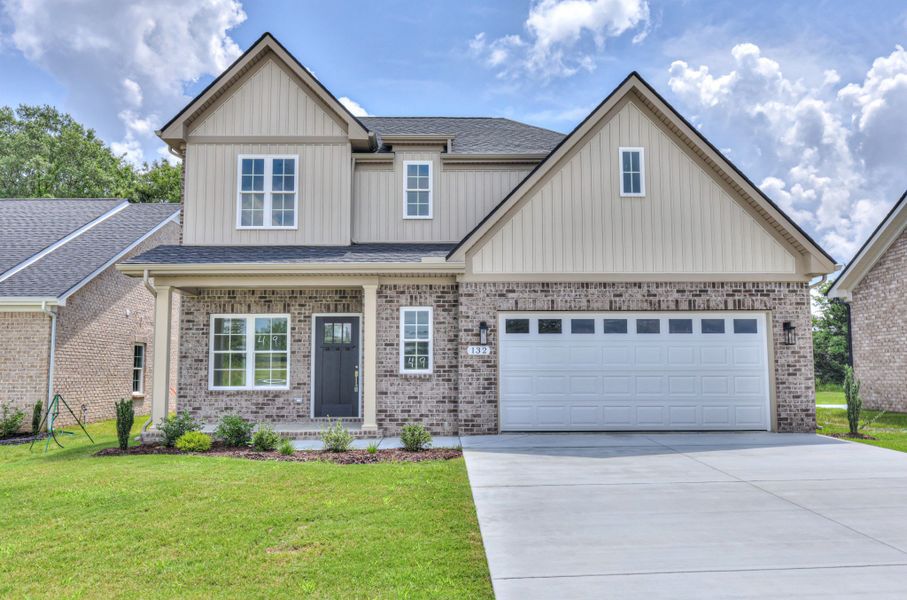 Front exterior of a new home in Legacy Preserve, Tullahoma, TN, highlighting curb appeal (Image 2). Front exterior of a new home in Legacy Preserve, Tullahoma, TN, highlighting curb appeal (Image 2).