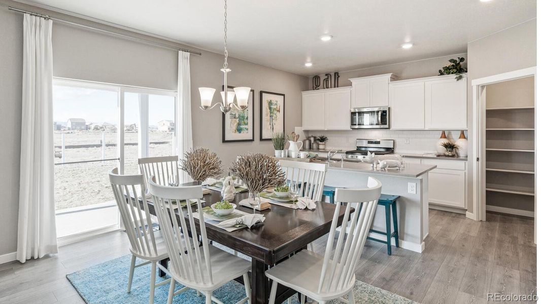 Furnished interior view inside a new home in Trails at Crowfoot, Parker (Image 18).
