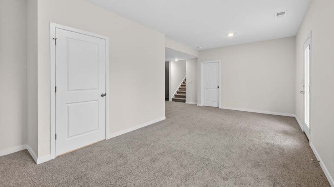 Spacious, unfurnished interior of a new home in Rydele Heights, Asheville (Image 24).