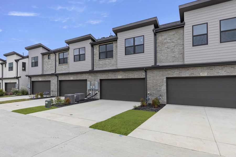Front exterior of a new home in Ten Mile Creek, Celina, TX, highlighting curb appeal (Image 24).