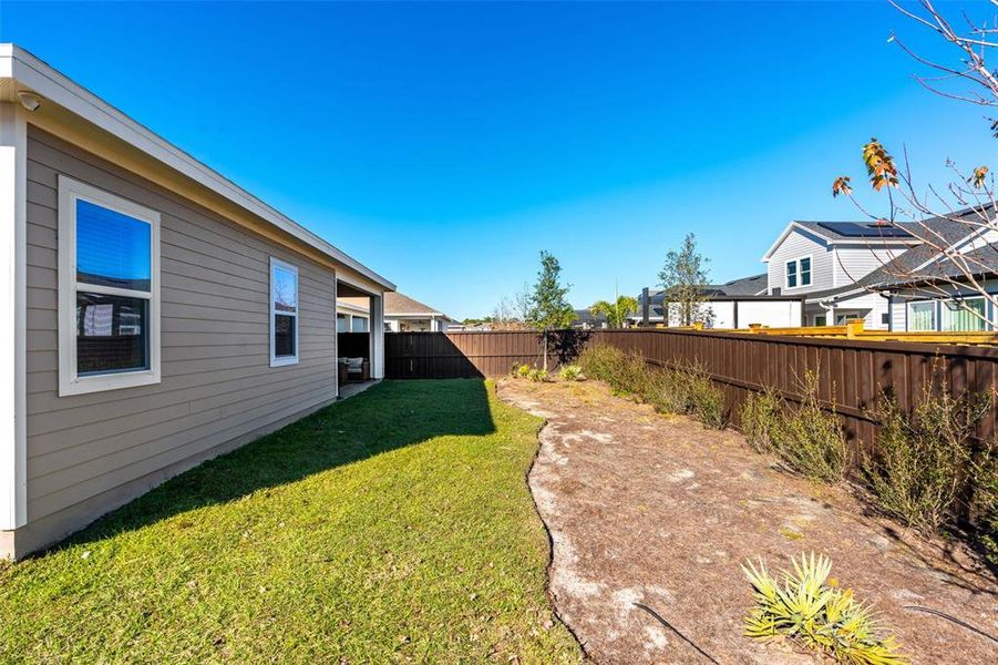 Exterior details and patio area of a home in Weslyn Park at Sunbridge, St. Cloud (Image 31).