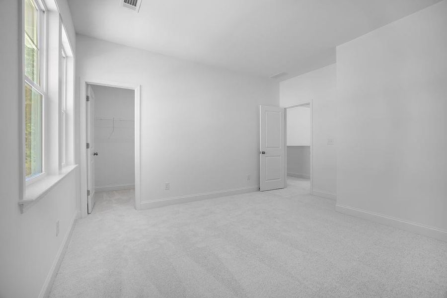 Spacious, unfurnished interior of a new home in Bailey Fence, Dacula (Image 25).