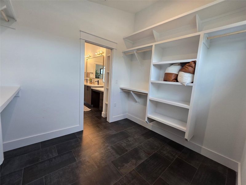 Primary closet is big enough to be its own room! Lots of storage options.
