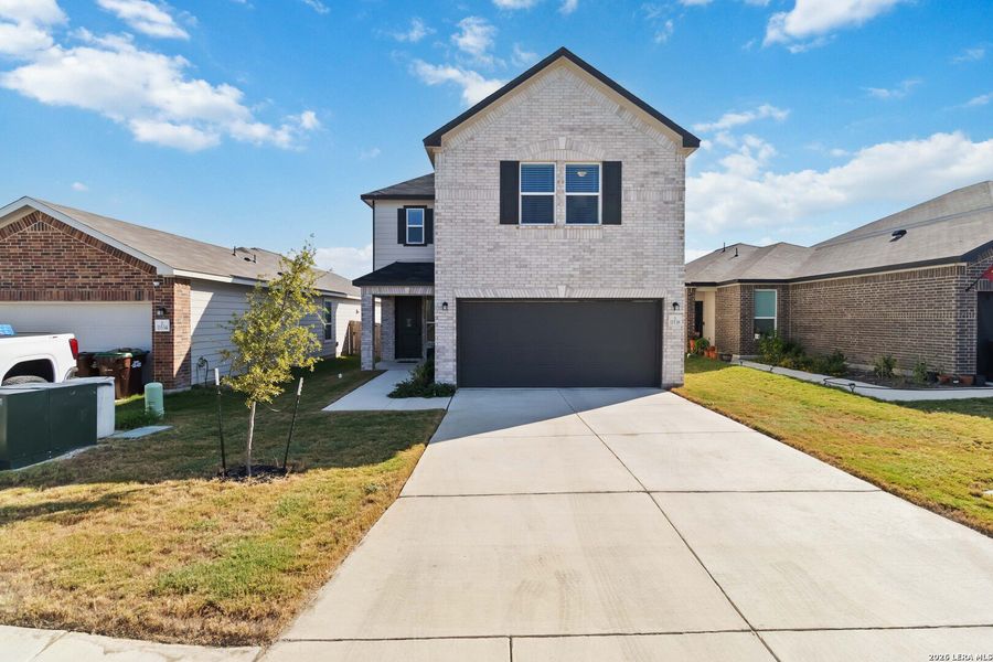 Front exterior of a new home in , San Antonio, TX, highlighting curb appeal (Image 1). Front exterior of a new home in , San Antonio, TX, highlighting curb appeal (Image 1).