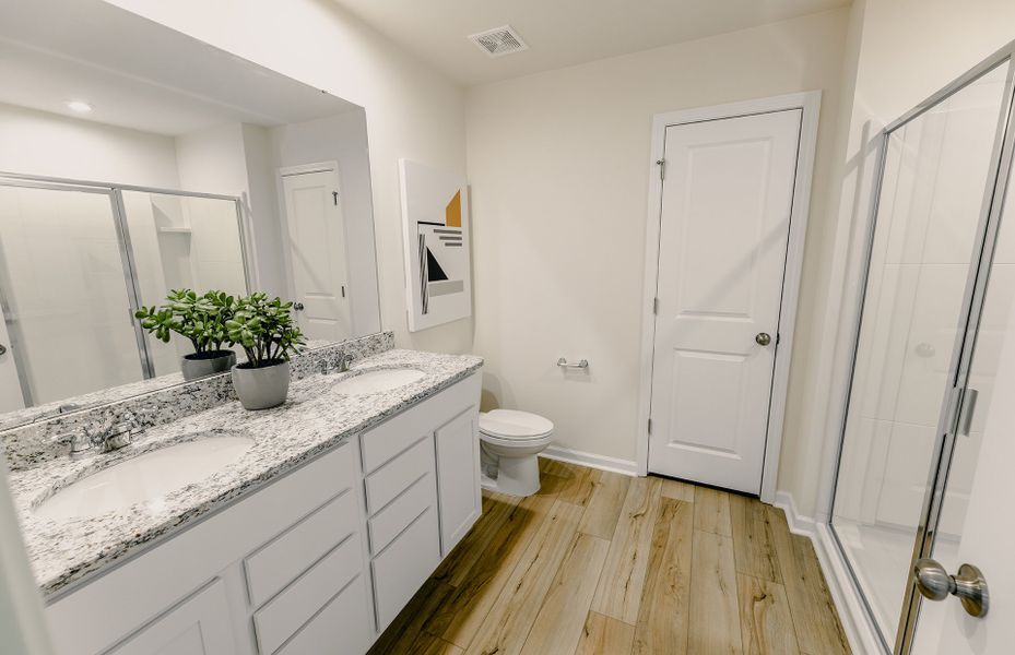 Owner's Suite with Walk-in Shower and Dual Bowl Va