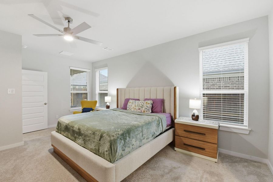 one of the three bedrooms on the second floor