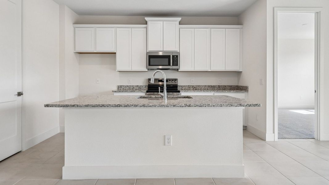 Acacia Floor Plan Kitchen in New Home Community Lakeside at Satilla in St. Cloud, FL Acacia Floor Plan Kitchen in New Home Community Lakeside at Satilla in St. Cloud, FL