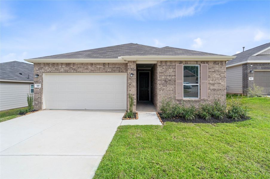 Welcome home to 660 Appaloosa Meadow Drive located in Mustang Ridge and zoned to Magnolia ISD.