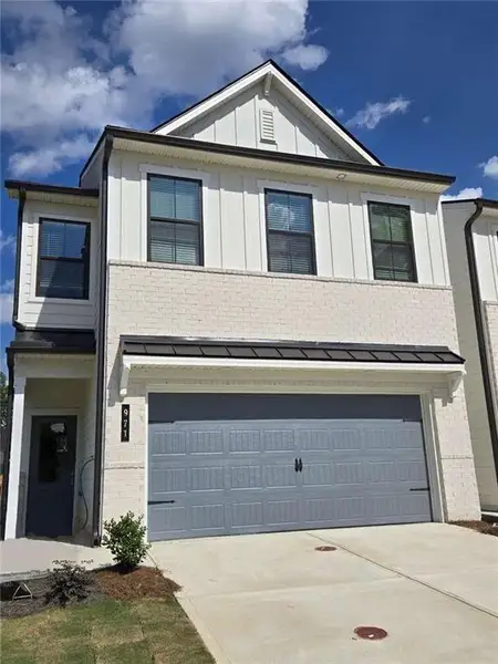 Front exterior of a new home in , Lawrenceville, GA, highlighting curb appeal (Image 28).