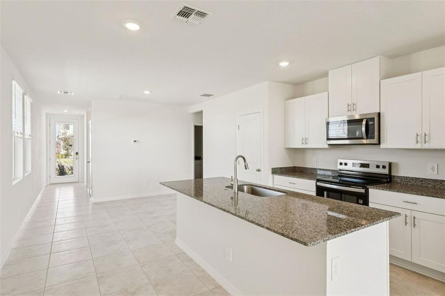 Furnished interior view inside a new home in Crosswinds - Classic Series, Haines City (Image 13).