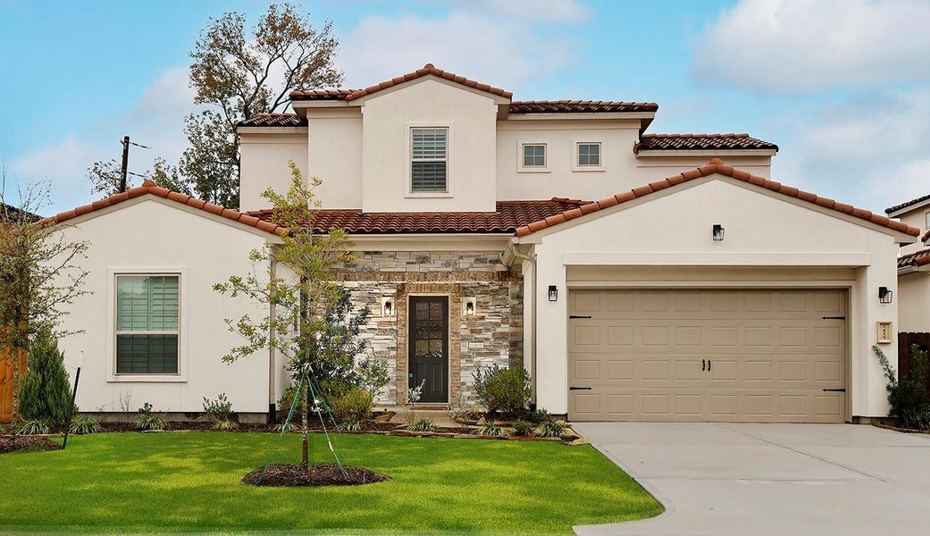 Front exterior of a new home in Malaga Forest, Shenandoah, TX, highlighting curb appeal (Image 1).