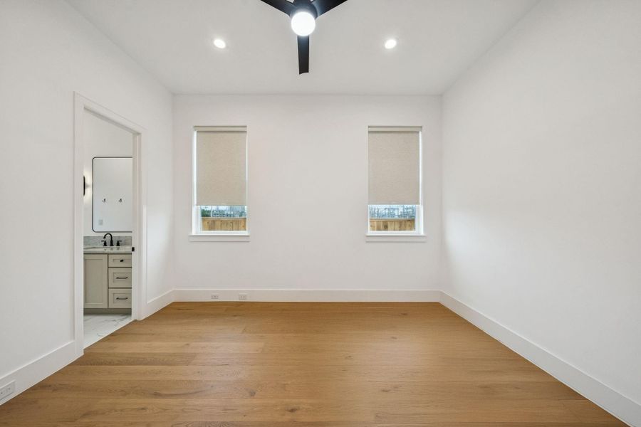 First bedroom down, can be a secondary primary bedroom on the first floor, has it's own en suite and private entrance from the exterior