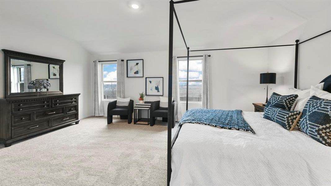 Spacious room featuring light-colored carpeting, recessed lighting, and multiple windows Spacious room featuring light-colored carpeting, recessed lighting, and multiple windows