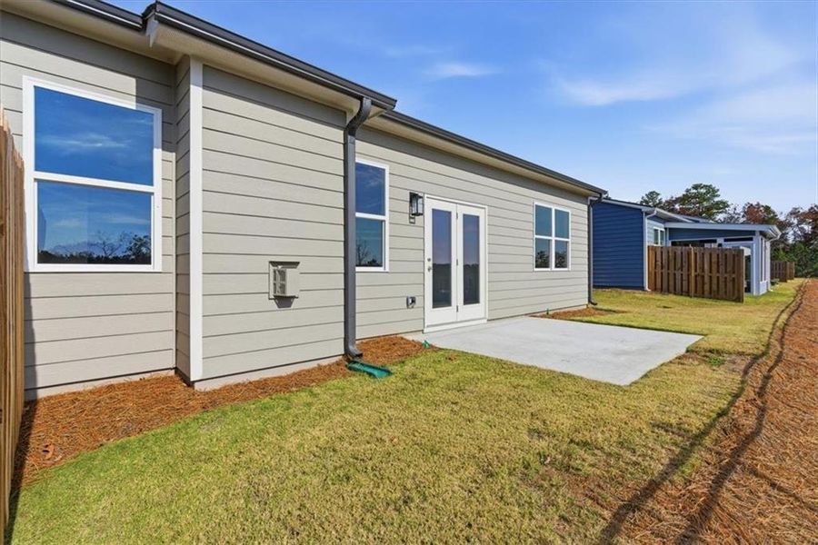 Exterior details and patio area of a home in Lakeside at Great Sky, Canton (Image 22).