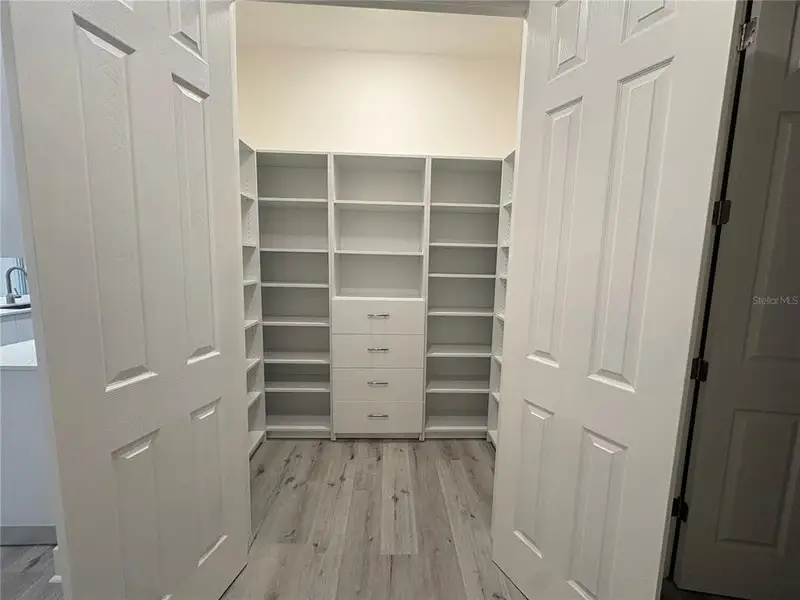 Spacious, unfurnished interior of a new home in , Port Charlotte (Image 15).