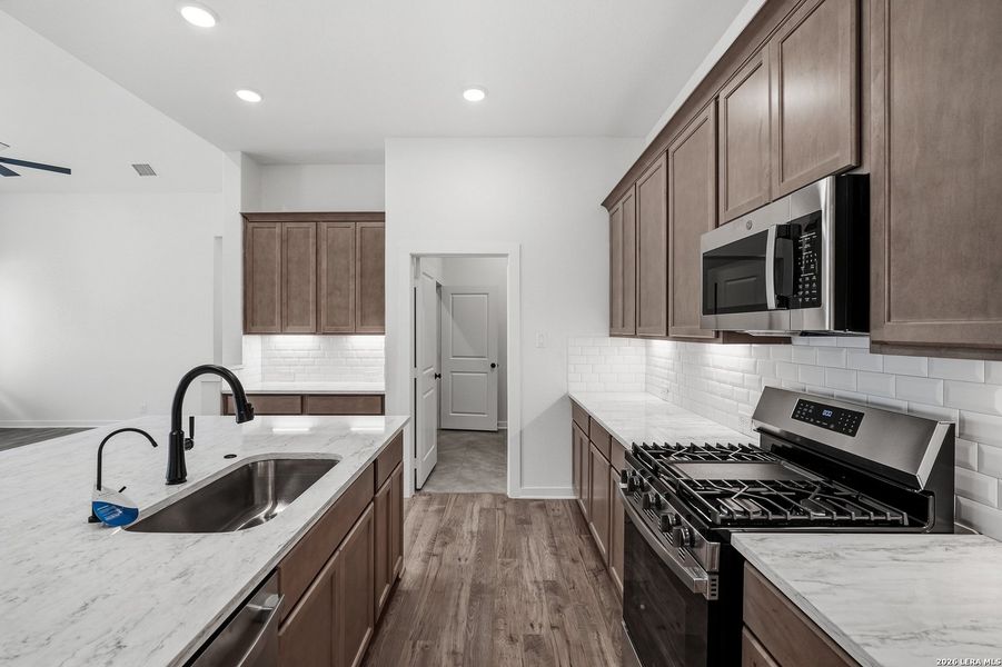Furnished interior view inside a new home in The Crossvine, Schertz (Image 13).