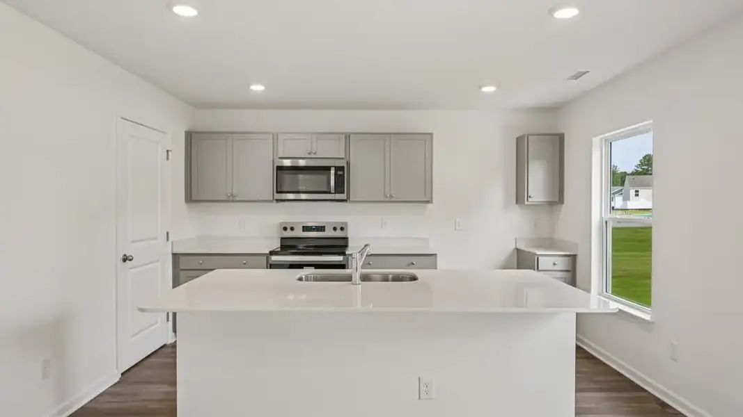 Furnished interior view inside a new home in Mangum Farms, Stem (Image 5).