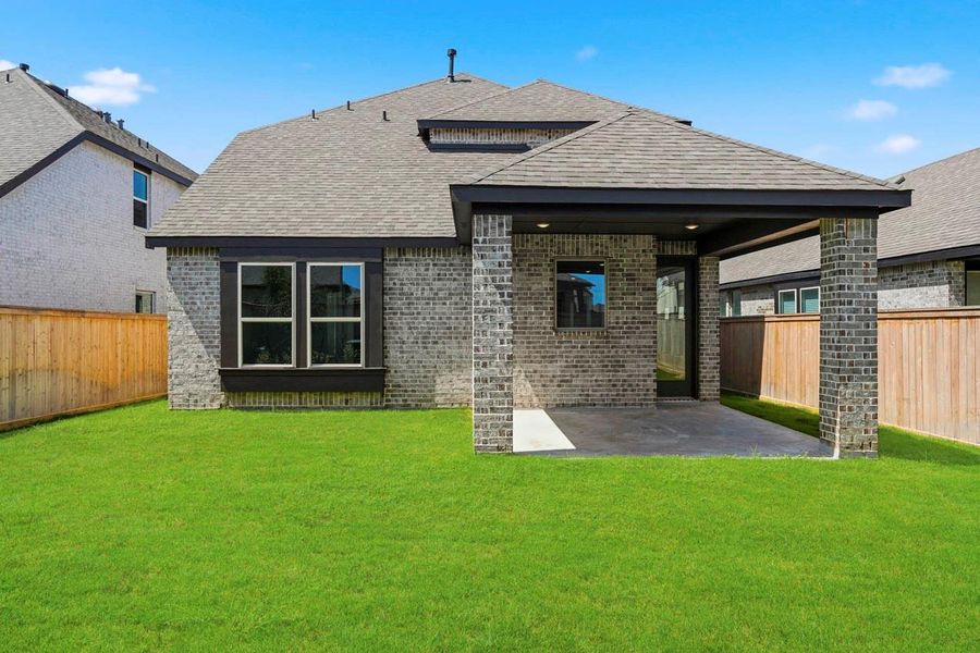Exterior details and patio area of a home in Bridgeland, Cypress (Image 3).