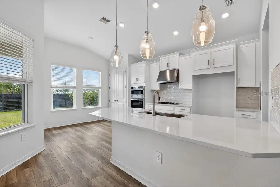 Furnished interior view inside a new home in Coasterra Community Group Page, Palmetto (Image 5).