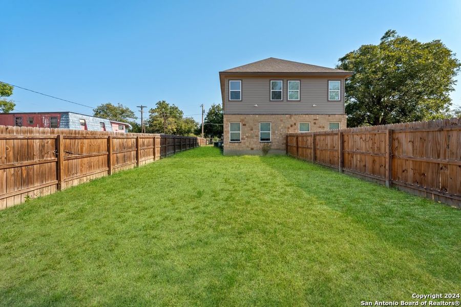 Front exterior of a new home in , Natalia, TX, highlighting curb appeal (Image 2).