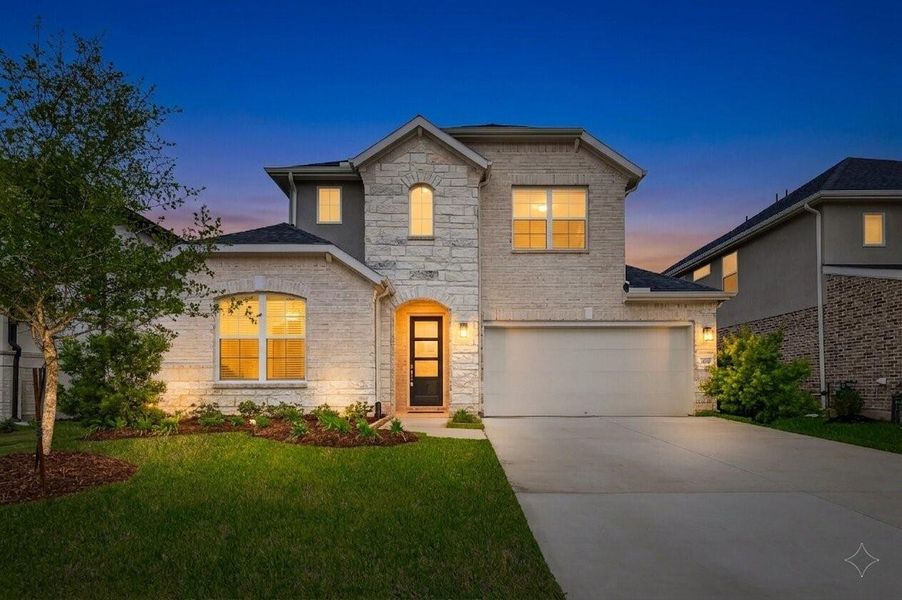 Twilight Photo: New Construction – Never Lived in! This stunning 2025 D R Horton 4 bedroom (2 bedrooms Down), 3.5 baths “Rockdale Plan” is breathtaking! This 2-story home features a beautiful brick-and-stone elevation with elegant stucco accents and an inviting front porch.