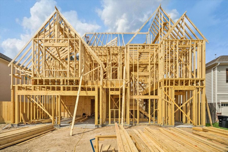 Harvard Homes presents a fresh take on modern comfort at 1510 Chantilly, crafted with natural light, designer fixtures throughout and a built-in pool. The first floor opens with a bright great room framed by a wall of windows and built-in cabinetry, flowing easily into the dining room and a generous verandah. *Current construction 2/26/26