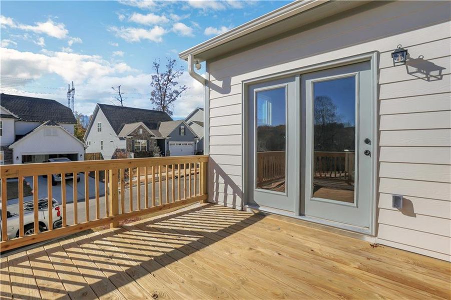 Exterior details and patio area of a home in Marble Tree, Ball Ground (Image 23).