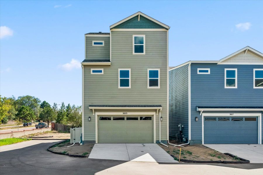 Front exterior of a new home in Pony Park, Colorado Springs, CO, highlighting curb appeal (Image 2).