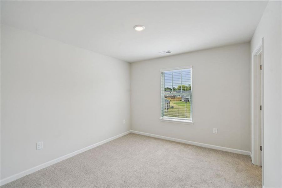 Spacious, unfurnished interior of a new home in Westmont Preserve, Powder Springs (Image 34).