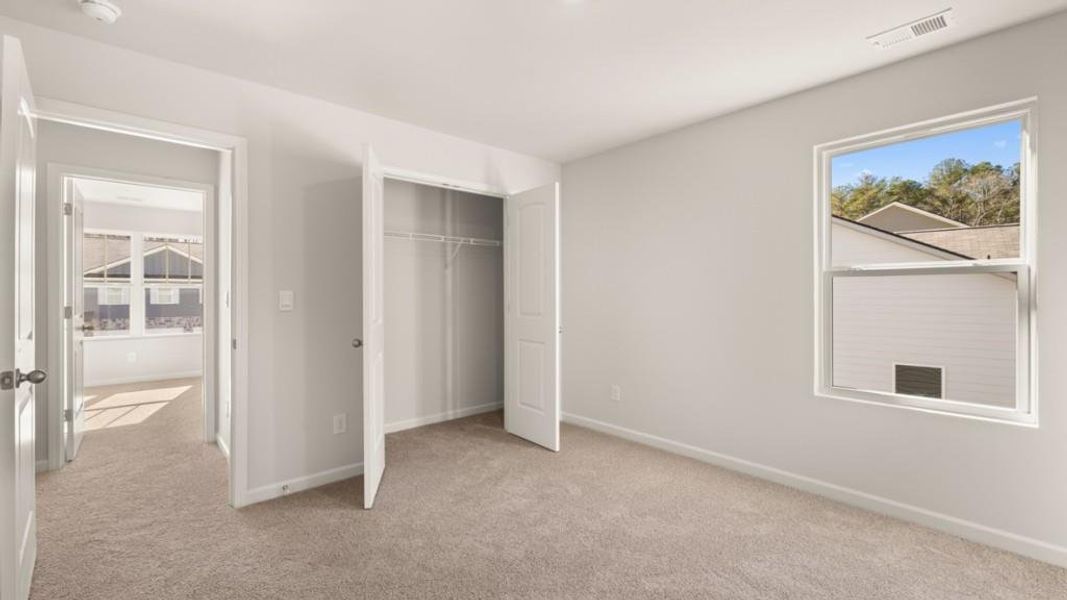 Spacious, unfurnished interior of a new home in South Wind, Fairburn (Image 21).