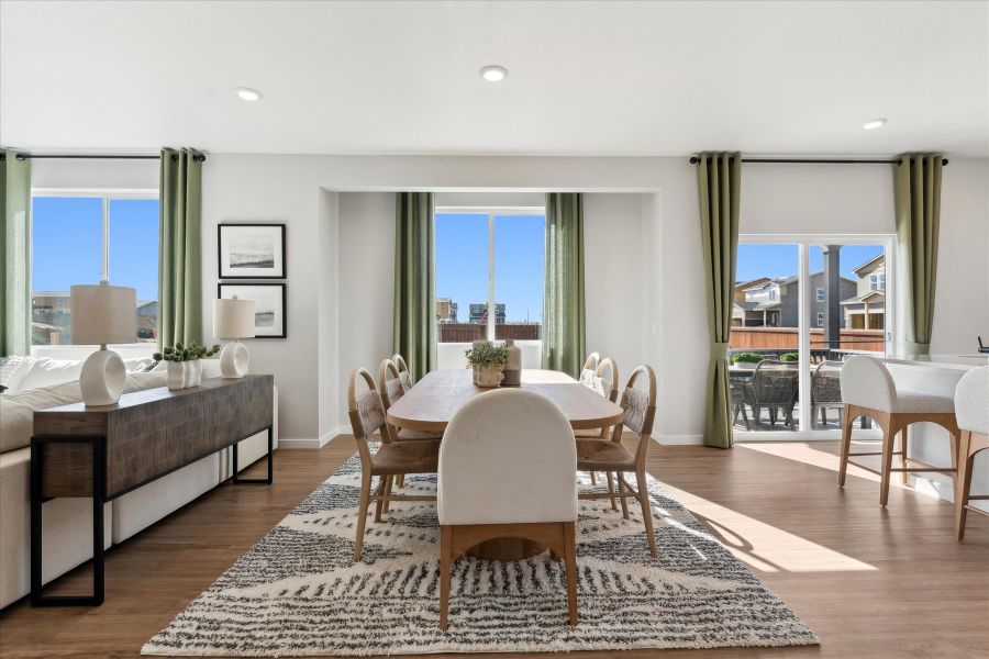 A room with a table and chairs. A room with a table and chairs.