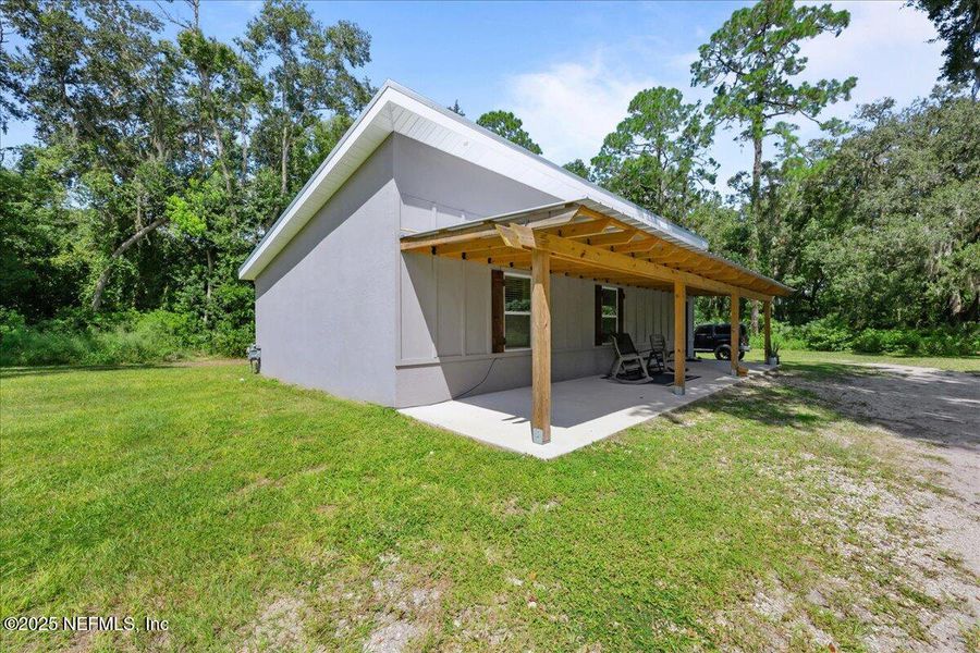 Front exterior of a new home in , Palatka, FL, highlighting curb appeal (Image 18).