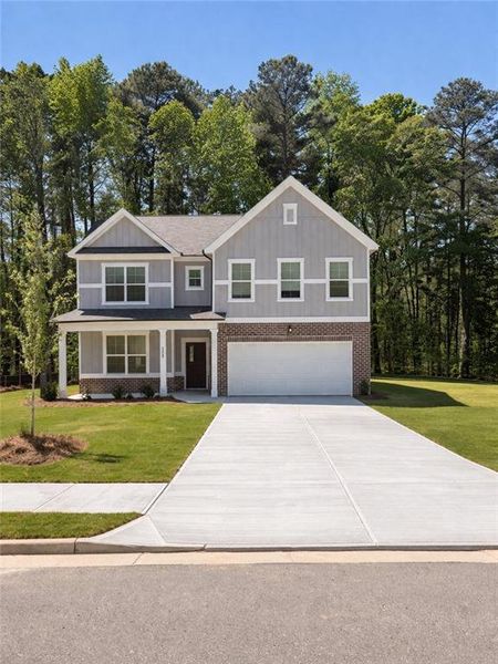 Front exterior of a new home in Whisper Creek, Atlanta, GA, highlighting curb appeal (Image 1). Front exterior of a new home in Whisper Creek, Atlanta, GA, highlighting curb appeal (Image 1).