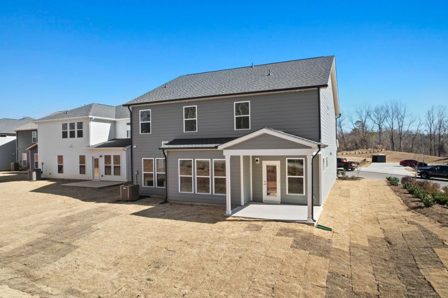 Exterior details and patio area of a home in Elmbrook, Indian Trail (Image 20).