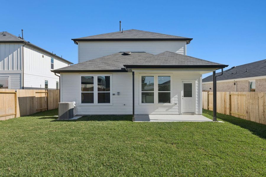 Exterior details and patio area of a home in Montgomery Bend, Montgomery (Image 3).